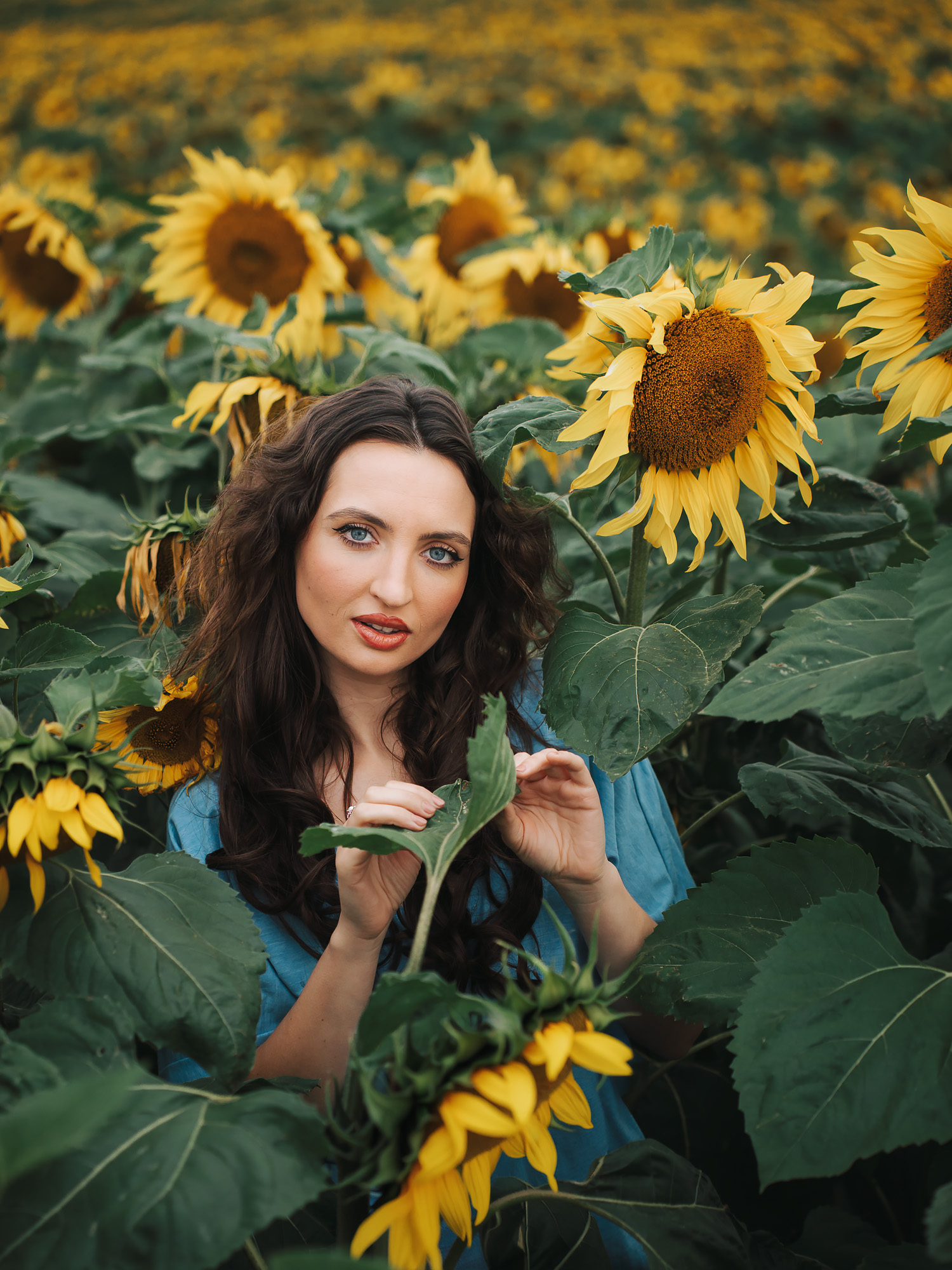Full-length editorial portrait among sunflowers in East Lothian by DScotia Captures